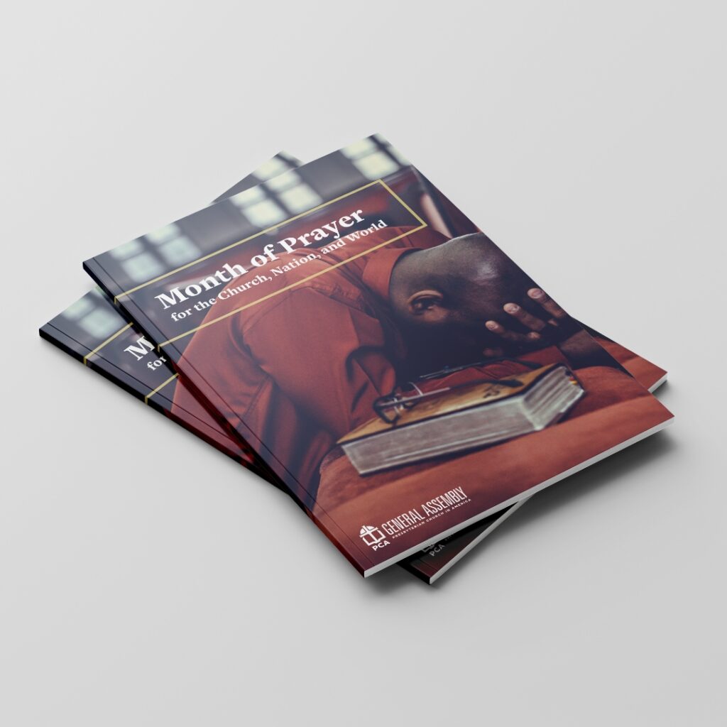 General Assembly Month of Prayer magazine with dark-toned cover featuring creative photography and modern layout.